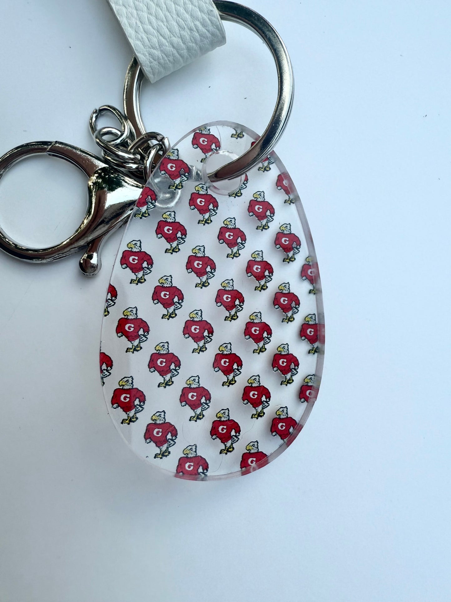 Geneva Eagles Acrylic Keychain with White Faux Leather Strap